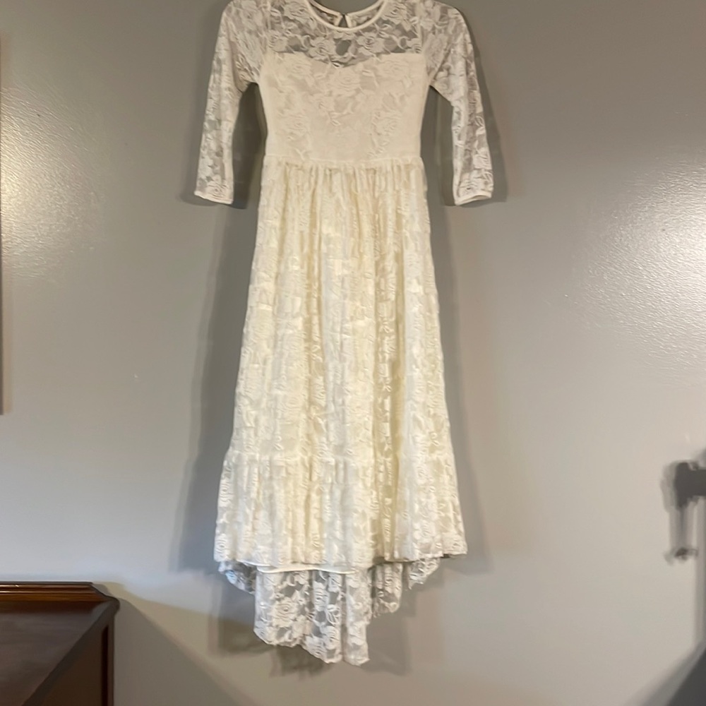 flower girl or first communion dress size 12-14. Light off white color.